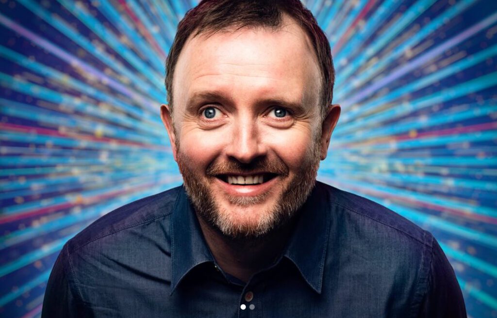 Chris McCausland smiles to the camera for his official Strictly Come Dancing portrait.